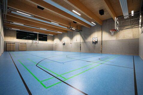 Sportzentrum Hoheluft Halle Innenansicht einer Sporthalle mit blauen Boden, markierten Spielfeldern und Basketballkörben an der Wand.